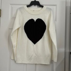 Cream sweater with black heart